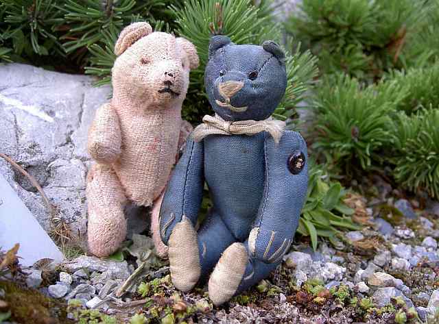 Miniature vintage teddy bears, made of rose plush and blue silk